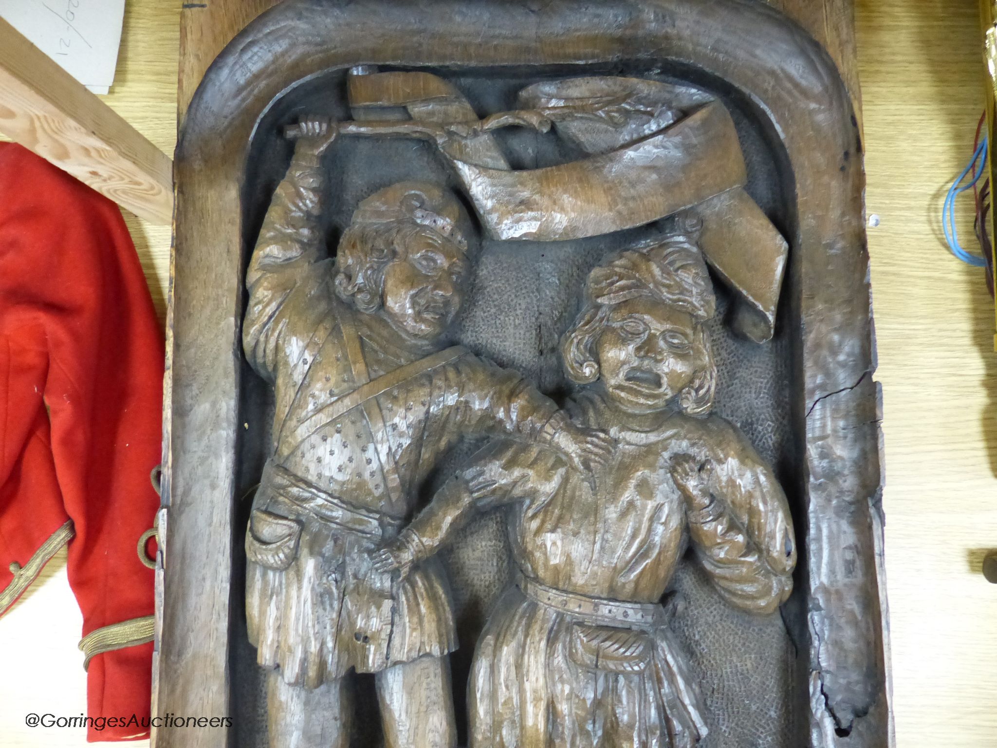 A 16th / 17th century carved oak panel